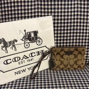 Coach Signature monogram Wristlet; vintage